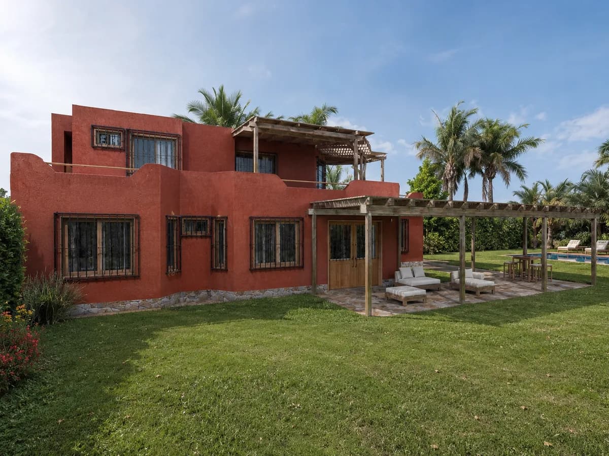 Visual de referencia de una vivienda campestre integrada con jardín